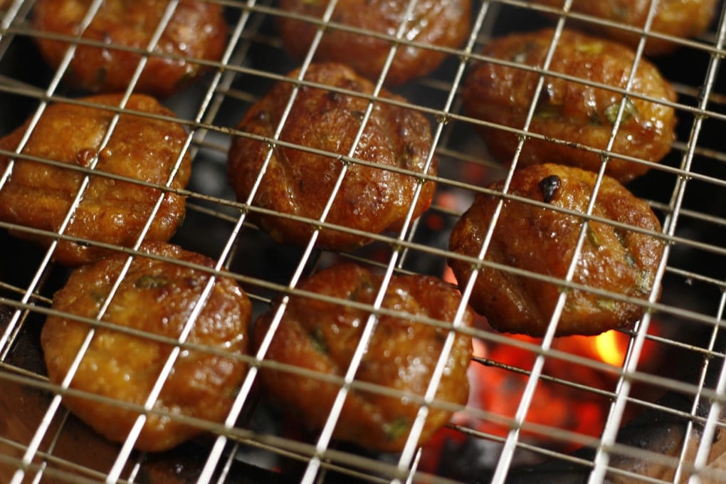 The pork is marinated and grilled over charcoal for a smoky, flavorful bite
